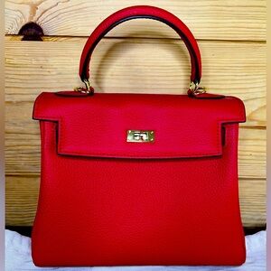 This Item is in EXCELLENT condition! HERMES Kelly 28 bag in RED